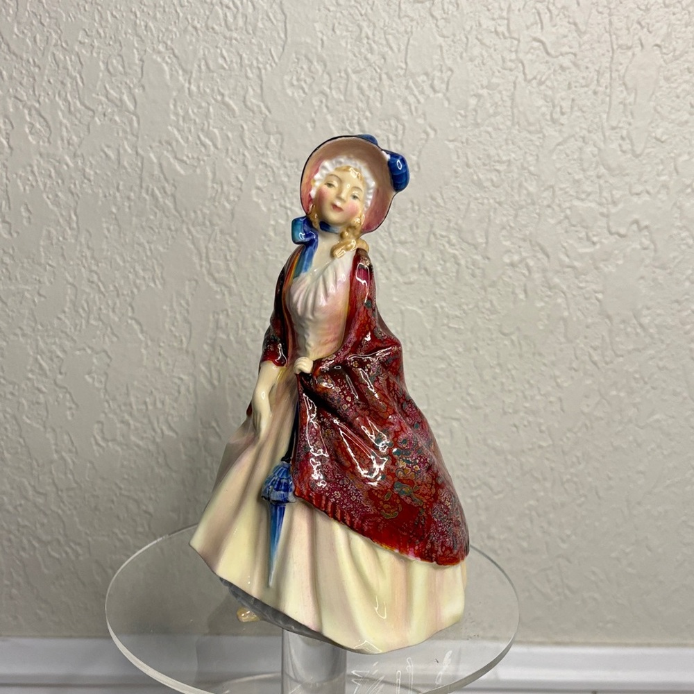 Elegant Red and Cream Figurine